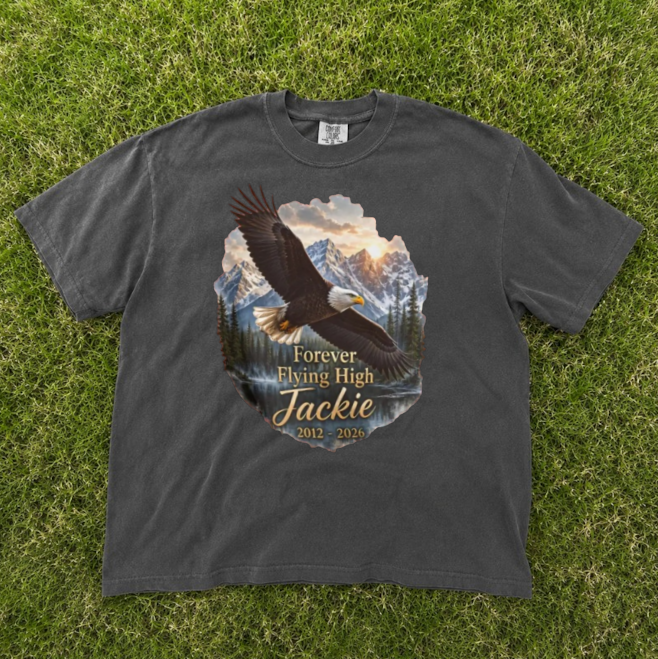 JACKIE BALD EAGLE MEMORIAL TEE, FOREVER FLYING HIGH 2012 2026, BIG BEAR EAGLE CAM TRIBUTE TEE BN-00277