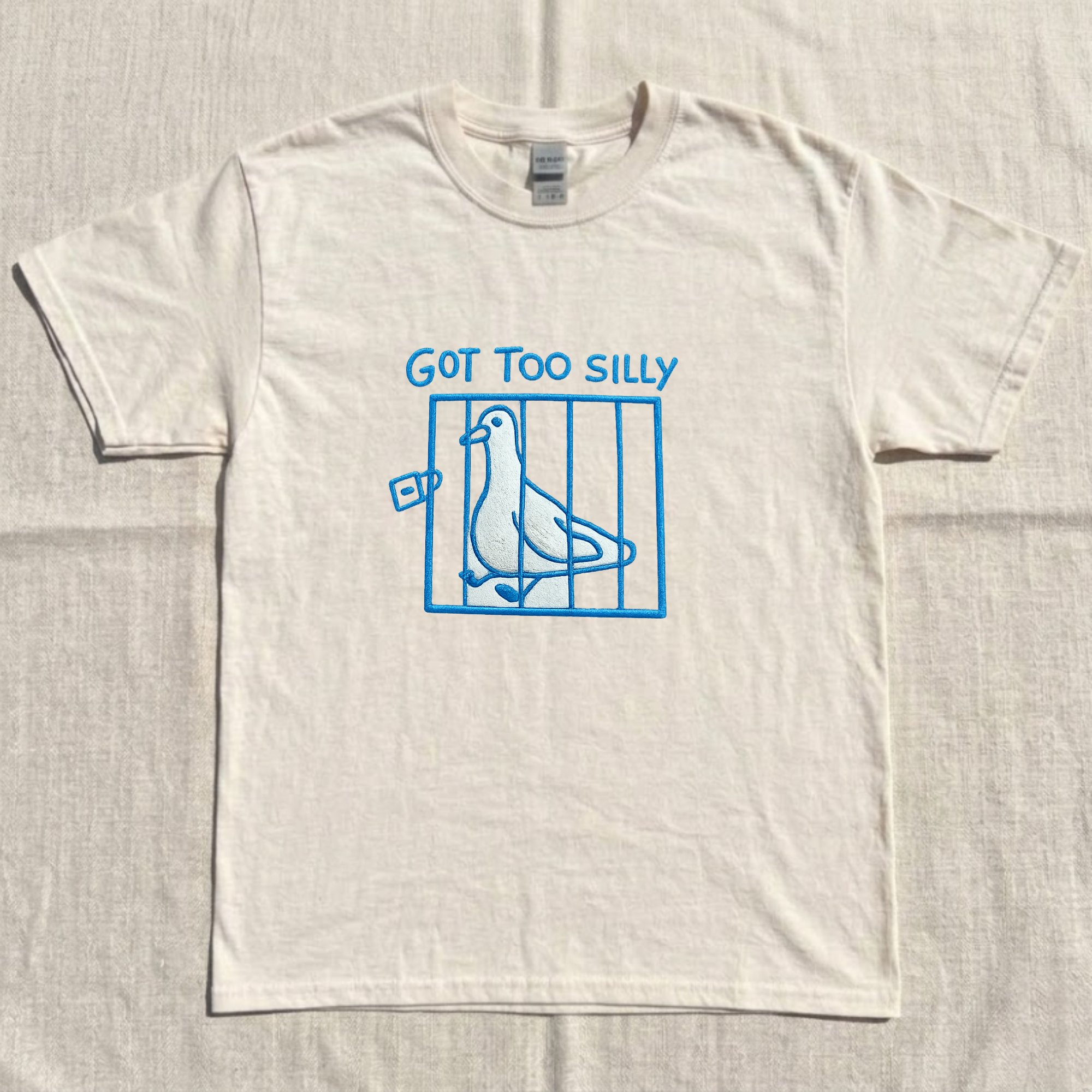 GOT TOO SILLY PIGEON IN CAGE EMBROIDERED TEE CT-0023